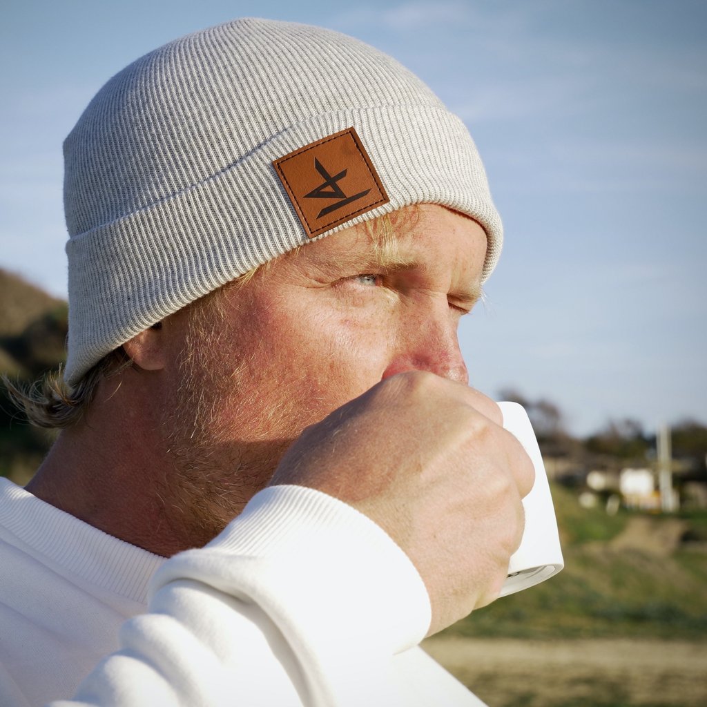 Gunnar Asmussen wearing Windsurf beanie drinking coffee